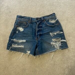 Darker wash jean shorts with rips size small